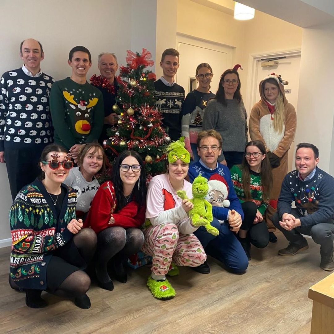 The Schlich team in their Christmas jumpers