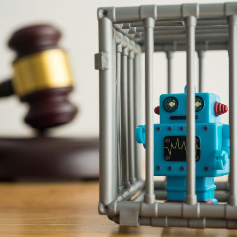toy robot in prison, with a gavel in the background